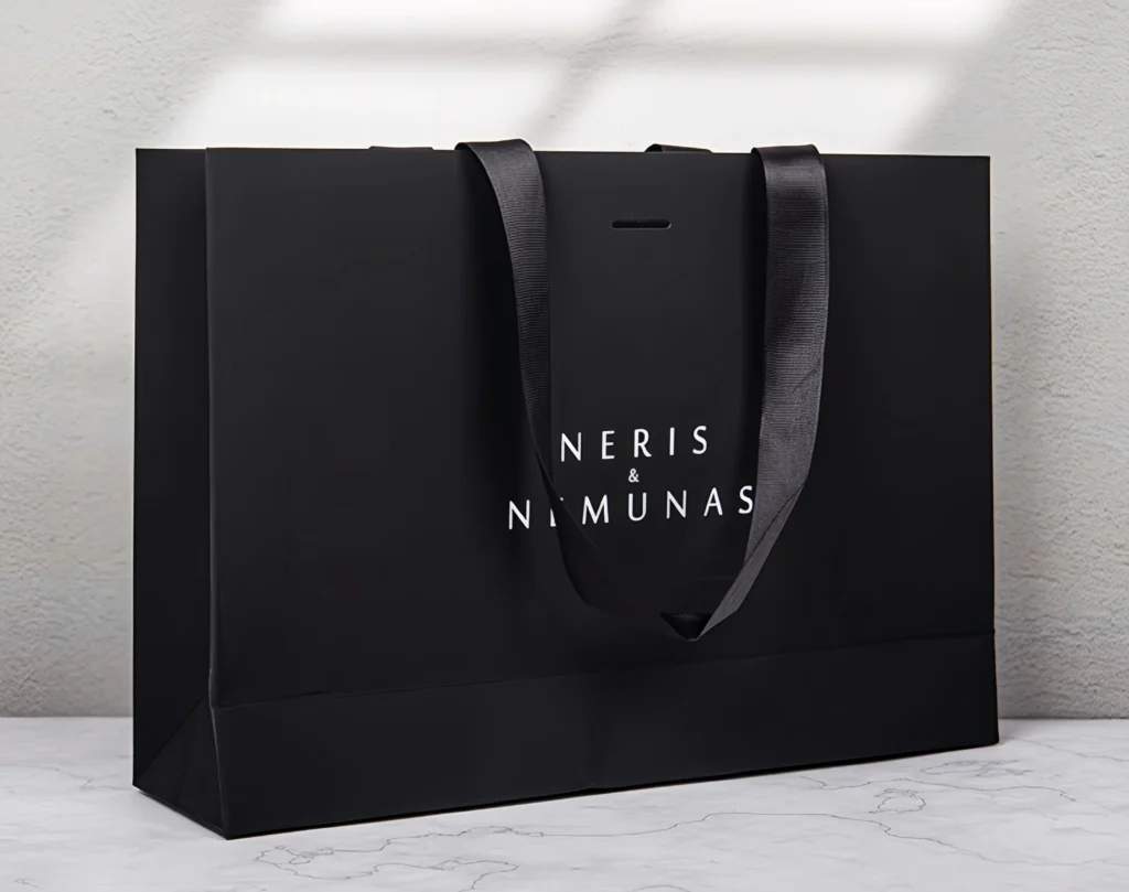 custom packaging supplier producing paper shopping bags in factory