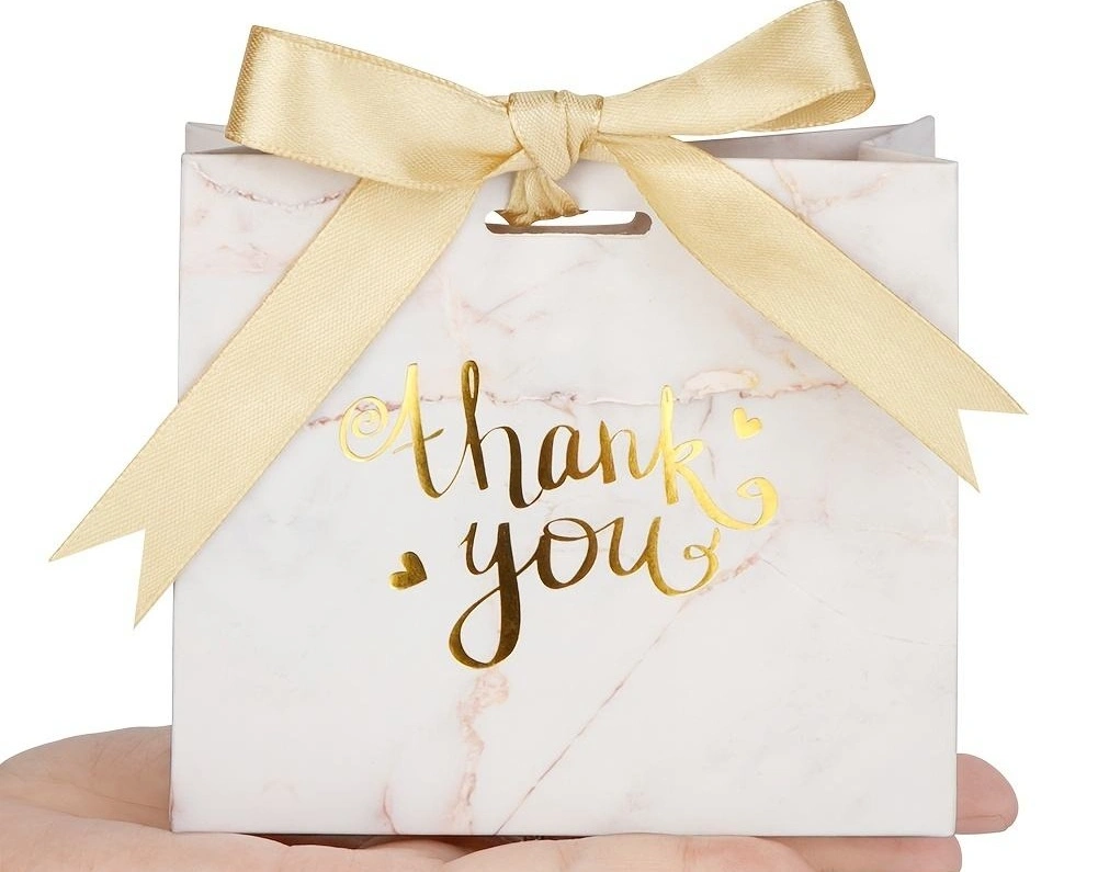 Hot foil stamping paper bags with luxury metallic logo printing for premium retail packaging