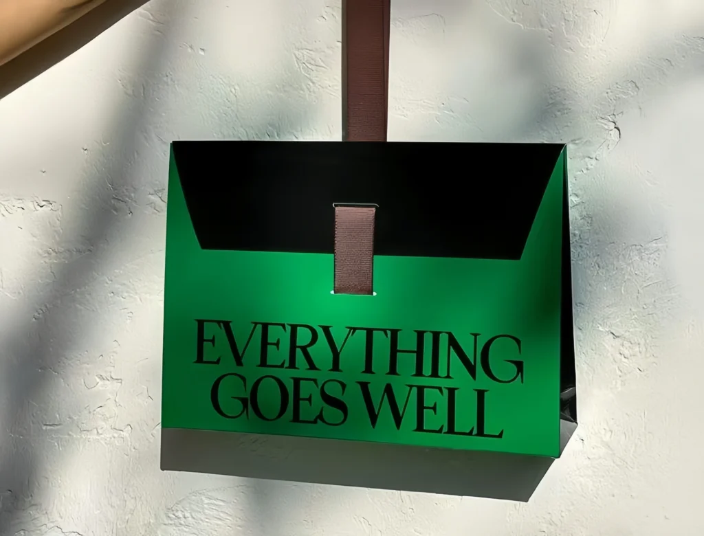 Paper bag for fashion brand packaging used in clothing and luxury apparel retail