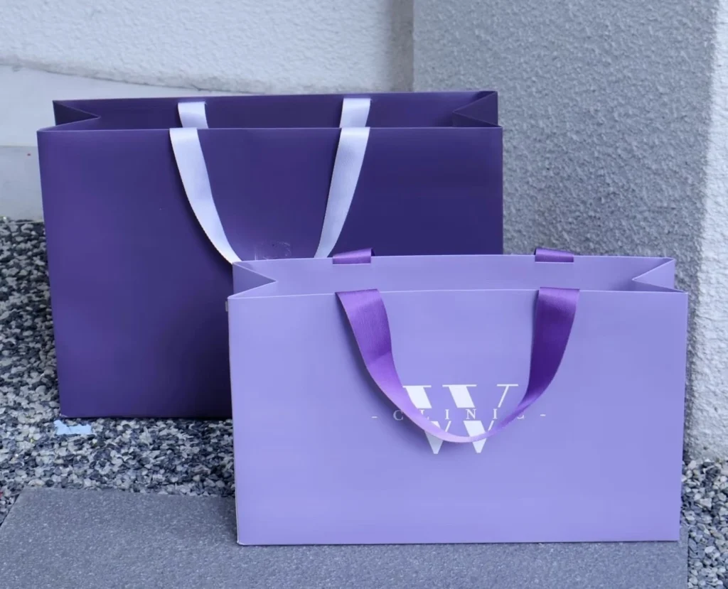 Custom printed paper bags with foil stamping and embossed logo